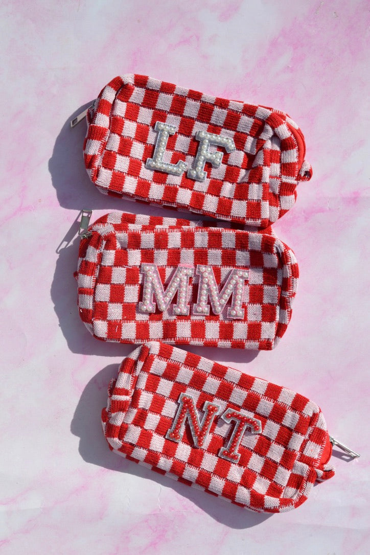 red checkered toiletry bag perfect for bachelorette party favors