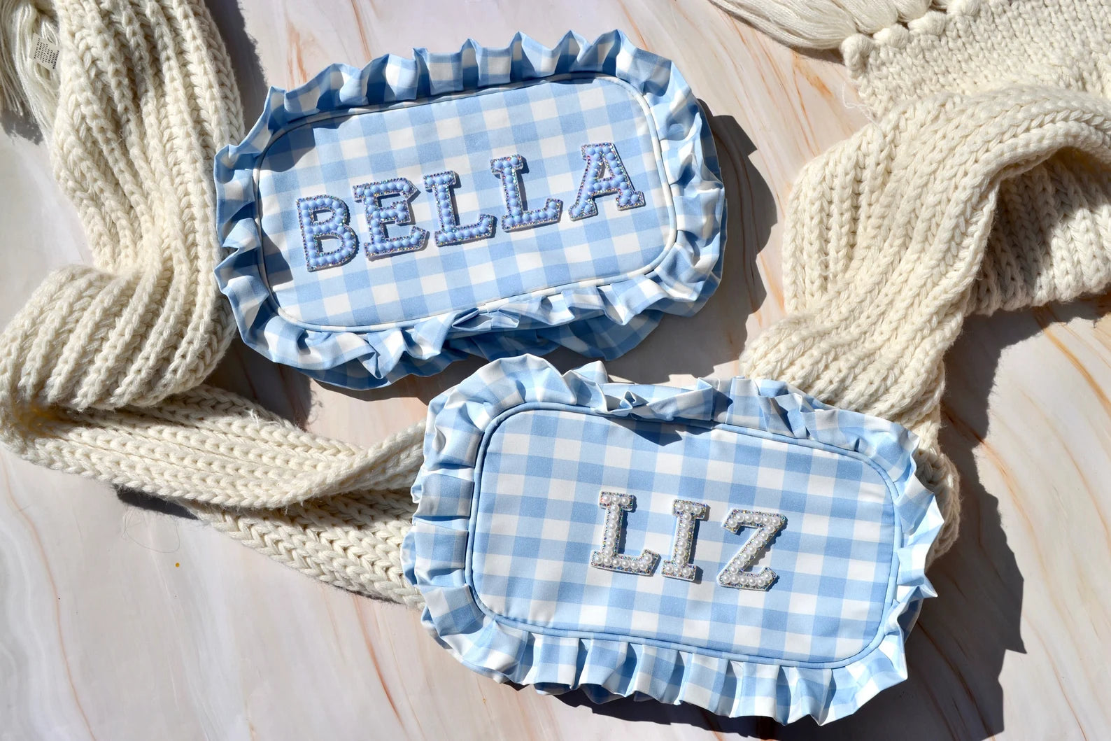 Custom blue ruffle makeup bag with personalized monogram for bridesmaids