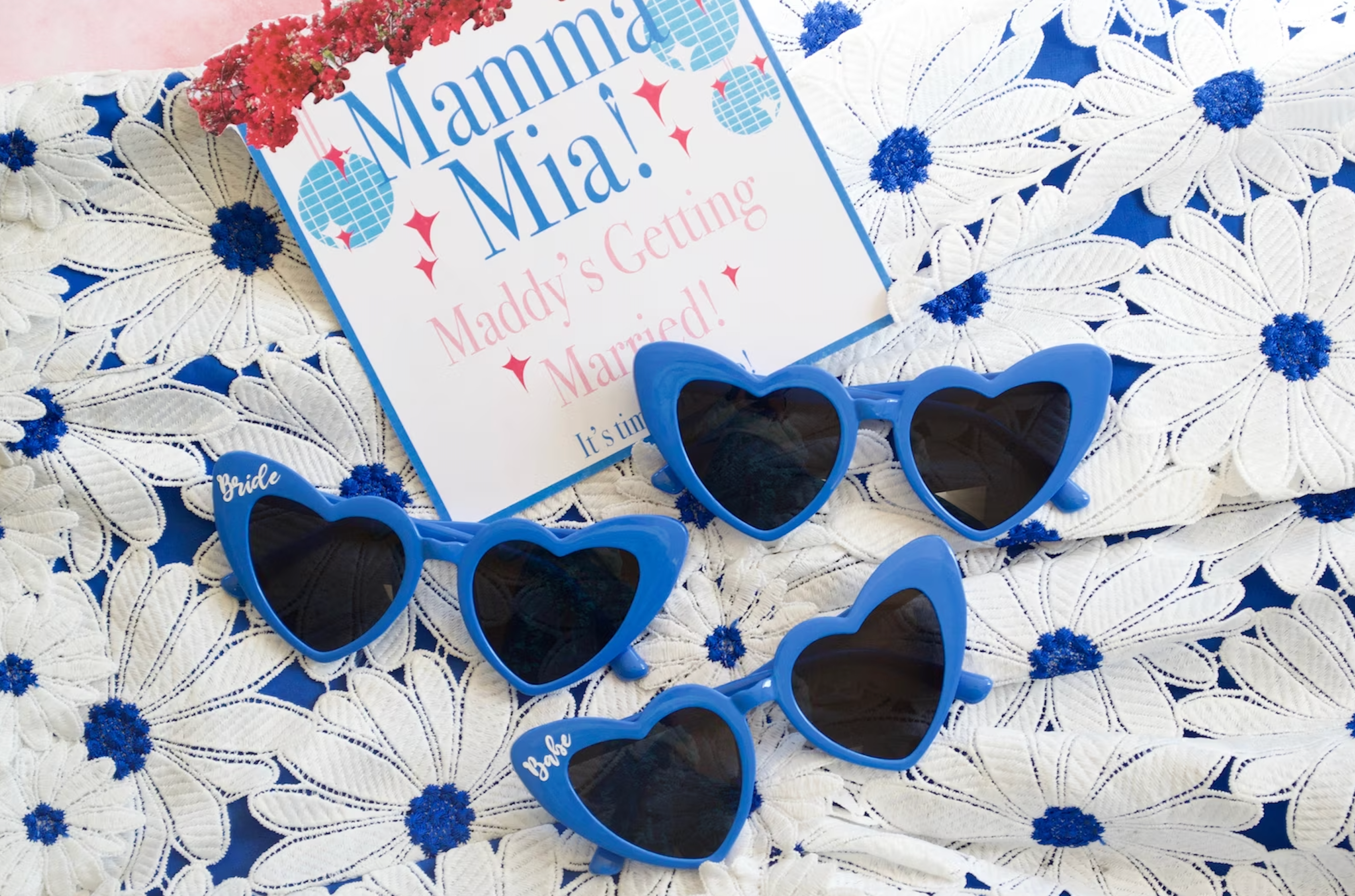 Blue heart-shaped sunglasses with vibrant frames